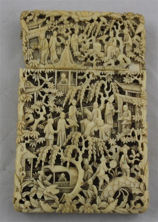 A Chinese export ivory card case and a similar brise fan, 19th century, 11.5cm & 20cm, losses